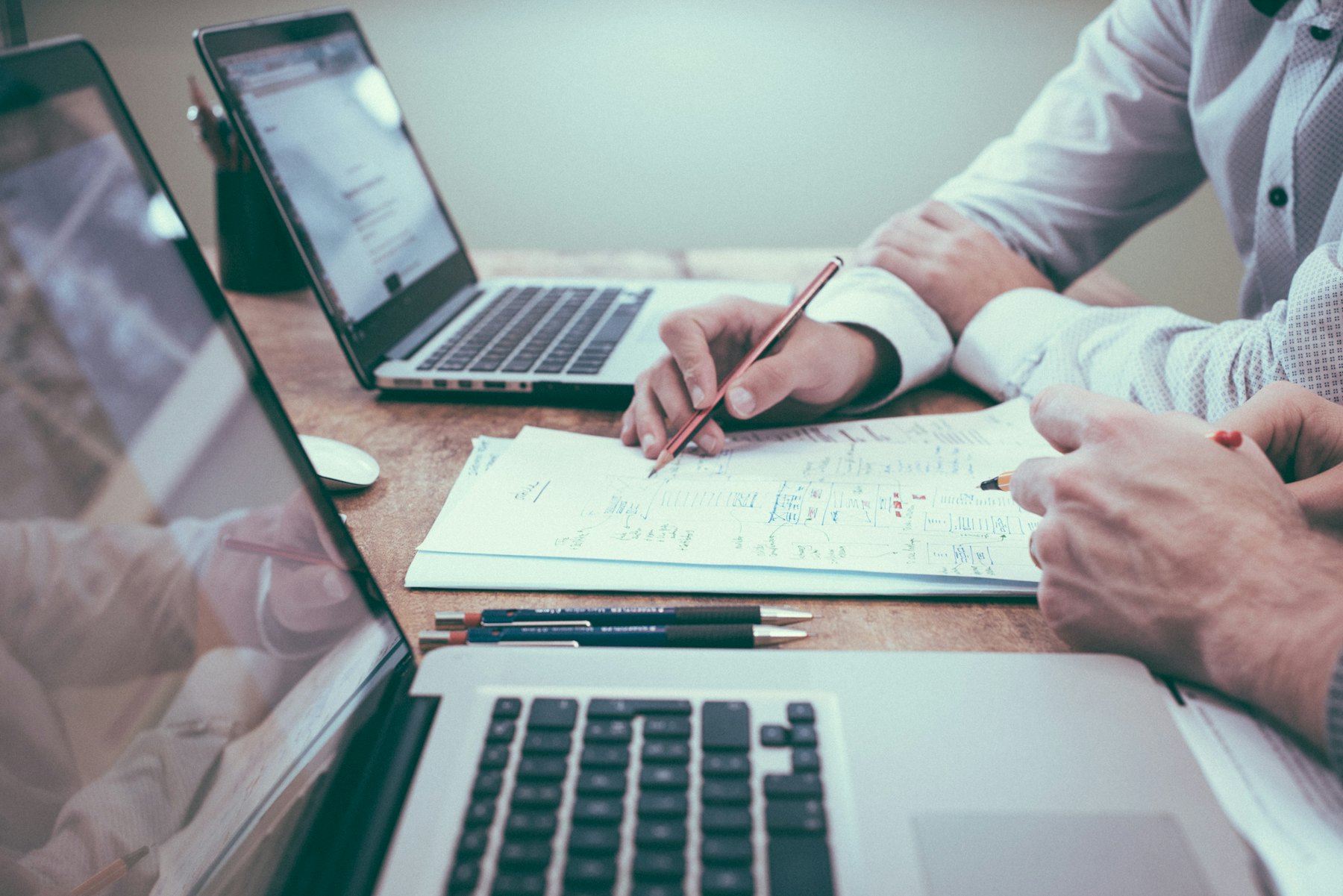 Consultant helping a client with business registration documents