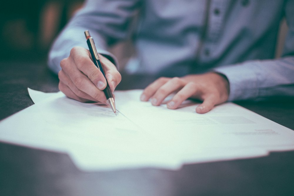 Signing business registration documents