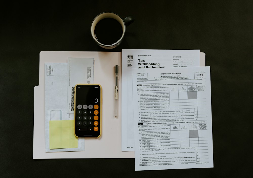 Financial planning documents with calculator