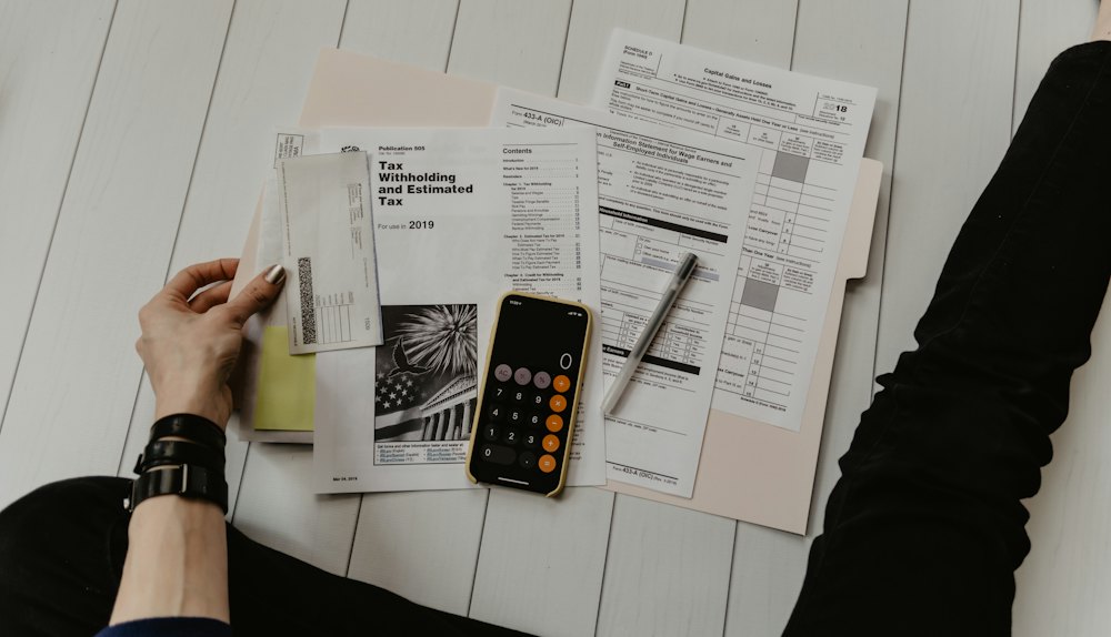 Calculator and tax documents for GST filing